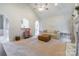 Open-concept living room with vaulted ceilings, seamlessly connecting to other rooms and offering a cozy atmosphere at 2079 Audubon Dr, Rock Hill, SC 29732