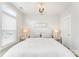Comfortable bedroom with a neutral color palette, stylish lighting, and cozy ambiance at 223 S Bruns Ave, Charlotte, NC 28208