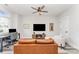 Bright living room featuring modern furniture, a large TV, and an inviting workspace at 223 S Bruns Ave, Charlotte, NC 28208