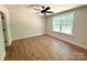 Bright bedroom with wood floors, a large window, and a ceiling fan at 2330 Neill Rd, Lancaster, SC 29720