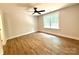 Bedroom with wood-look flooring and a window offering natural light at 2330 Neill Rd, Lancaster, SC 29720