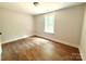 Bright bedroom with wood floors, window, and neutral paint, creating a relaxing atmosphere at 2330 Neill Rd, Lancaster, SC 29720