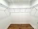 Spacious walk-in closet with wire shelving and wood-look floors at 2330 Neill Rd, Lancaster, SC 29720