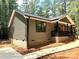 Exterior features brick accents, nice yard, and craftsman style at 2330 Neill Rd, Lancaster, SC 29720