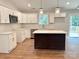 Stylish kitchen featuring white cabinetry, an island, and stainless steel appliances at 2330 Neill Rd, Lancaster, SC 29720