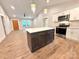 Spacious kitchen featuring an island with seating and stainless steel appliances at 2330 Neill Rd, Lancaster, SC 29720