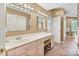 Bathroom with double vanity, plenty of cabinets, and updated fixtures at 24756 Strand Dr, Albemarle, NC 28001