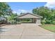 Large carport area featuring ample parking space and a well-maintained exterior with surrounding greenery and sunny skies at 24756 Strand Dr, Albemarle, NC 28001