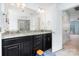 Bathroom features dual sinks, granite countertops, lighting, and access to bedroom at 2577 Shoal Park Rd, Concord, NC 28027