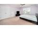Bedroom featuring a ceiling fan, window views, closet, and entertainment center at 2577 Shoal Park Rd, Concord, NC 28027