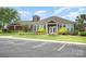 Charming clubhouse featuring well-manicured landscaping, white trim windows, and a welcoming entryway at 2577 Shoal Park Rd, Concord, NC 28027