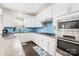 Bright kitchen with granite countertops, a stylish backsplash, and stainless steel appliances for a modern culinary experience at 2577 Shoal Park Rd, Concord, NC 28027