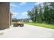 Back patio with outdoor seating, perfect for entertaining or relaxing in the backyard at 2577 Shoal Park Rd, Concord, NC 28027