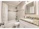 Bathroom featuring decorative tile and a granite countertop at 3020 Stancill Pl, Charlotte, NC 28205