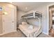 Bedroom with a bunk bed and neutral walls at 3020 Stancill Pl, Charlotte, NC 28205