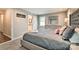 Bedroom with three doorways and a gray comforter at 3020 Stancill Pl, Charlotte, NC 28205