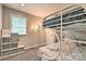 Bedroom with a bunk bed, shelf unit, and neutral walls at 3020 Stancill Pl, Charlotte, NC 28205