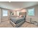 Bedroom with three windows, two dressers, and carpet floors at 3020 Stancill Pl, Charlotte, NC 28205
