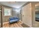 Cozy bedroom featuring a futon and a front door entry at 3020 Stancill Pl, Charlotte, NC 28205