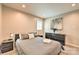 Bedroom with neutral walls, carpet floors, and a gray quilted comforter at 3020 Stancill Pl, Charlotte, NC 28205