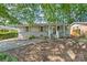 Charming single-story home featuring a welcoming front porch and wood-toned shutters at 3020 Stancill Pl, Charlotte, NC 28205