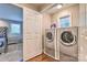 Laundry room with a bedroom visible through the doorway at 3020 Stancill Pl, Charlotte, NC 28205