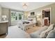 Comfortable bedroom featuring a large window, stylish decor, and soft lighting and ensuite bathroom at 327 Whitestone Rd, Charlotte, NC 28270