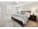 Bright bedroom with natural light, a comfortable king-size bed, and stylish decor at 327 Whitestone Rd, Charlotte, NC 28270