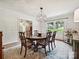 Dining room with hardwood floor, and modern lighting at 327 Whitestone Rd, Charlotte, NC 28270