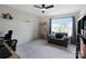 Bedroom featuring a comfortable sofa, neutral walls, and a bright window at 334 Kennerly Center Dr, Mooresville, NC 28115