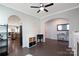 Open concept living space boasts hardwood floors, arched entryways, and great flow at 334 Kennerly Center Dr, Mooresville, NC 28115