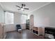 Inviting room featuring hardwood floors, neutral paint, and sunlit windows at 334 Kennerly Center Dr, Mooresville, NC 28115