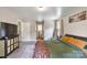 Spacious bedroom with neutral walls and ample sunlight, features a modern TV cabinet and comfortable bed at 3980 English Oak Dr, Lincolnton, NC 28092