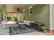 Comfortable covered patio with a ceiling fan, modern furniture, and a relaxing outdoor space at 3980 English Oak Dr, Lincolnton, NC 28092