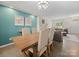 Inviting dining space with an eat-in area, adjacent to a living room, perfect for gatherings at 416 Linestowe Dr, Belmont, NC 28012