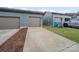 Three-car garage and driveway offer ample parking space and convenient access to the townhome at 416 Linestowe Dr, Belmont, NC 28012