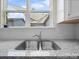 Kitchen window above stainless steel sink with double basin at 416 Linestowe Dr, Belmont, NC 28012