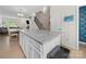 Kitchen island with granite countertops and white cabinets is conveniently located in the center of the space at 416 Linestowe Dr, Belmont, NC 28012