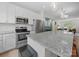 Kitchen with granite counters, stainless steel appliances, and a microwave at 416 Linestowe Dr, Belmont, NC 28012