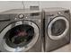 Modern laundry room showcasing front-loading washer and dryer at 416 Linestowe Dr, Belmont, NC 28012
