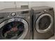 Modern laundry room showcasing front-loading washer and dryer at 416 Linestowe Dr, Belmont, NC 28012