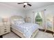 Charming bedroom with hardwood floors, neutral walls, and a comfortable bed with matching bedside tables at 441 Crestside Se Dr, Concord, NC 28025