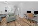 Relaxing living room area with a comfortable sofa and hardwood floors at 4607 Silk Tree Ln, Rock Hill, SC 29732