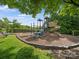 Well-maintained playground featuring climbing structures, slide, swings, and seating area for Gathering fun at 4607 Silk Tree Ln, Rock Hill, SC 29732