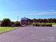 A quaint barn is located on the premises providing a charming view of nature at 5111 Elementary View Dr, Charlotte, NC 28269
