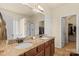 Bathroom features a double-sink vanity with granite countertops at 5111 Elementary View Dr, Charlotte, NC 28269