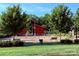 Community splash pad featuring a water play area, benches, and picnic tables at 5111 Elementary View Dr, Charlotte, NC 28269