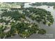 Scenic aerial view of 512 Rosebush Ln, Clover, SC, highlighting lakefront property and lush surroundings at 512 Rosebush Ln, Clover, SC 29710