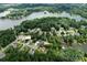 Stunning aerial view of 512 Rosebush Ln, Clover, SC showcasing the home's lakeside location and surroundings at 512 Rosebush Ln, Clover, SC 29710