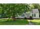 Quaint home featuring a well-maintained lawn and mature trees providing shade and curb appeal at 514 Saluda Rd, Chester, SC 29706